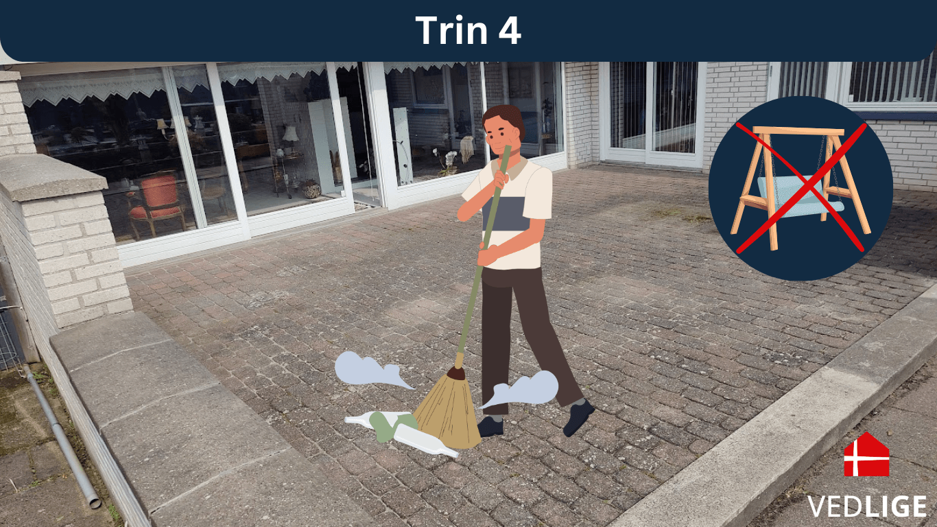 Mand som fejer og fjerner møbler inden fliserens